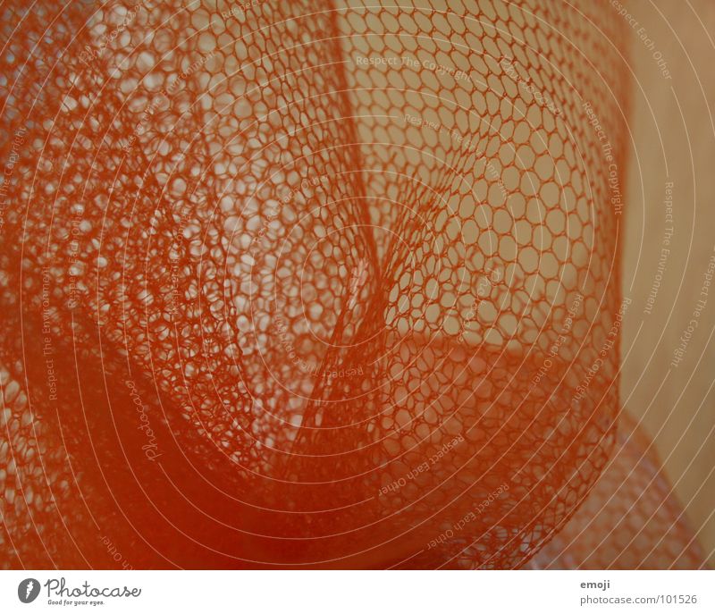 vernetzt Vernetzung Holz Makroaufnahme Geschenkpapier verpackt Stoff Loch knallig außergewöhnlich Rätsel Nahaufnahme Netz orange einpacken paper raten
