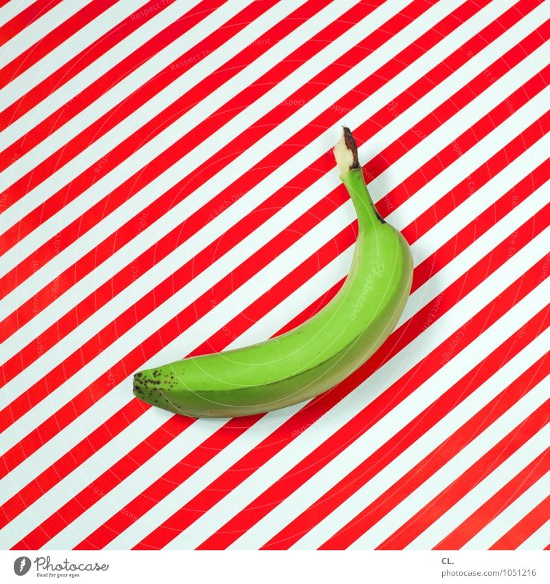 grün Lebensmittel Frucht Banane Ernährung Essen Bioprodukte Diät Gesundheit Gesunde Ernährung Kunst Streifen rot weiß ästhetisch Farbe skurril Farbfoto