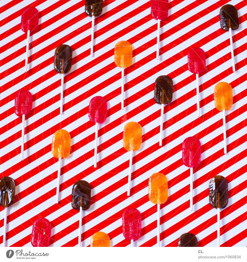 dauerlutscher Lebensmittel Süßwaren Lollipop Ernährung Essen Freude ästhetisch Fröhlichkeit frisch süß braun orange rot weiß Design Farbe Inspiration