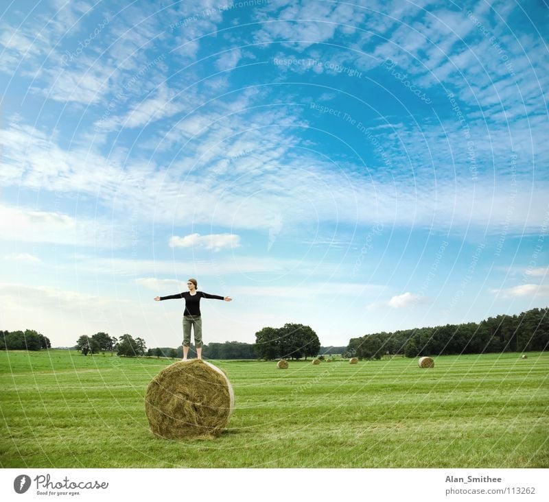 enjoying the nature Natur Meditation Blauer Himmel Sommer springen Freude Frau meadow country side young woman bale hay green grass spread arms freedom