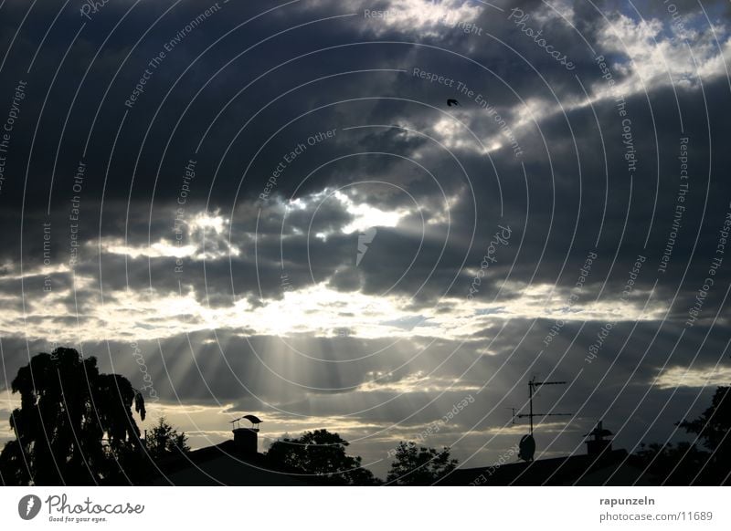 Kleinstadtwunder #1 Wolken dramatisch Strahlung Wunder Sonne Himmel Abend