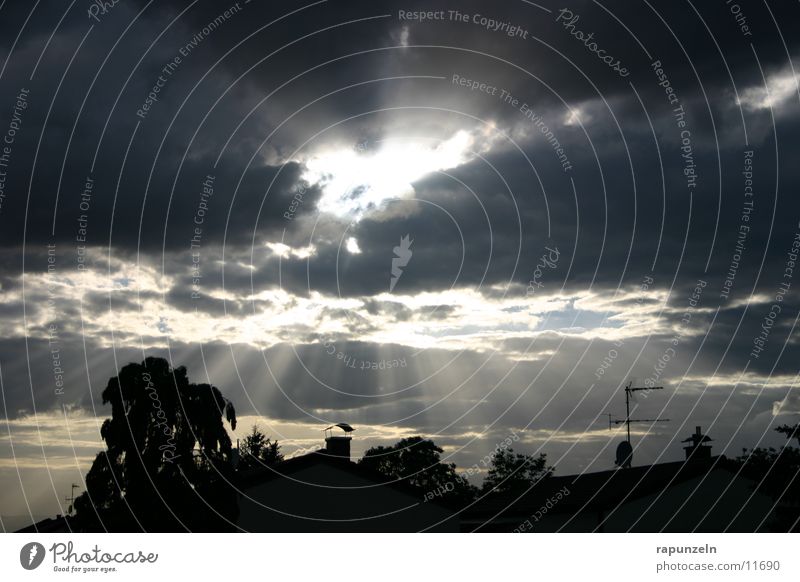Kleinstadtwunder #3 Wolken dramatisch Strahlung Wunder Sonne Himmel Abend