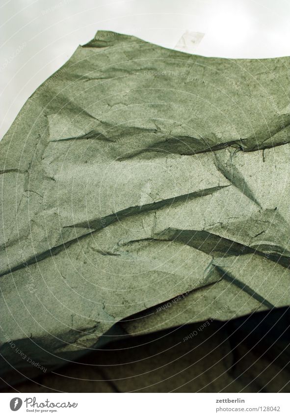 Papier Falte Strukturen & Formen Granit Sandstein Platzhalter Fälschung Vergänglichkeit obskur Bogen Seite zerquetschen knitterfalten Felsen durchsichtig