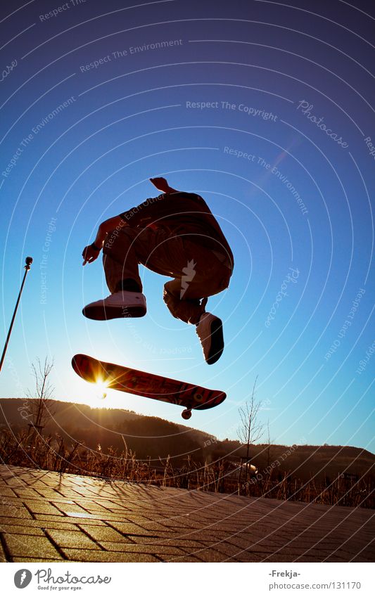 Sun wheel springen Silhouette Sport Spielen Skateboarding Sonne fliegen silhoutte sun Blauer Himmel