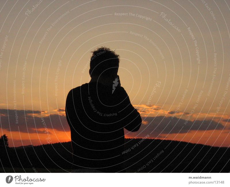der fotograf und sein motiv Fotograf Silhouette Wolken Dämmerung Mann Fotokamera Schatten Sonne Abend Berge u. Gebirge Sonnenuntergang