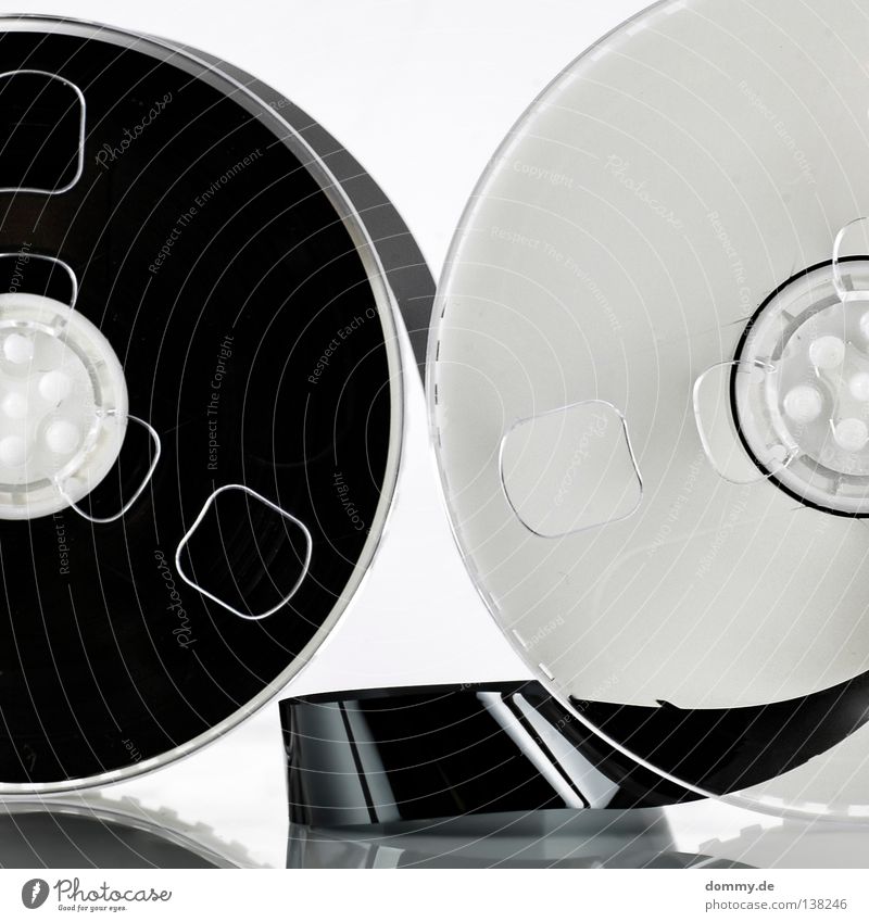 technik dino Musikkassette weiß schwarz rund Video sichtbar Videorekorder passieren Reflexion & Spiegelung Licht weich abgerollt Rolle Spielen Hollywood
