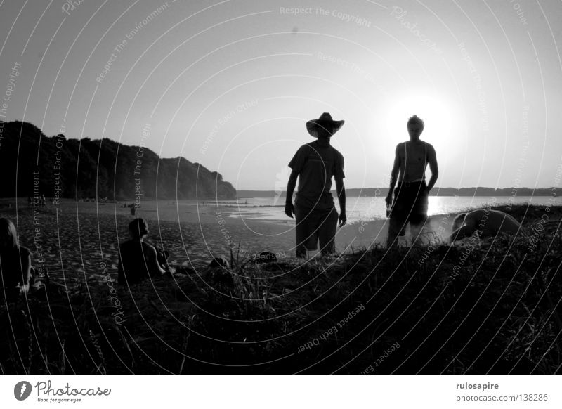 Sonnenhut Sommer tief untergehen Physik Mann Texas Cowboy Cowboyhut Strohhut Strand Meer Flensburg Schleswig-Holstein Abenteuer Freizeit & Hobby Gegenlicht