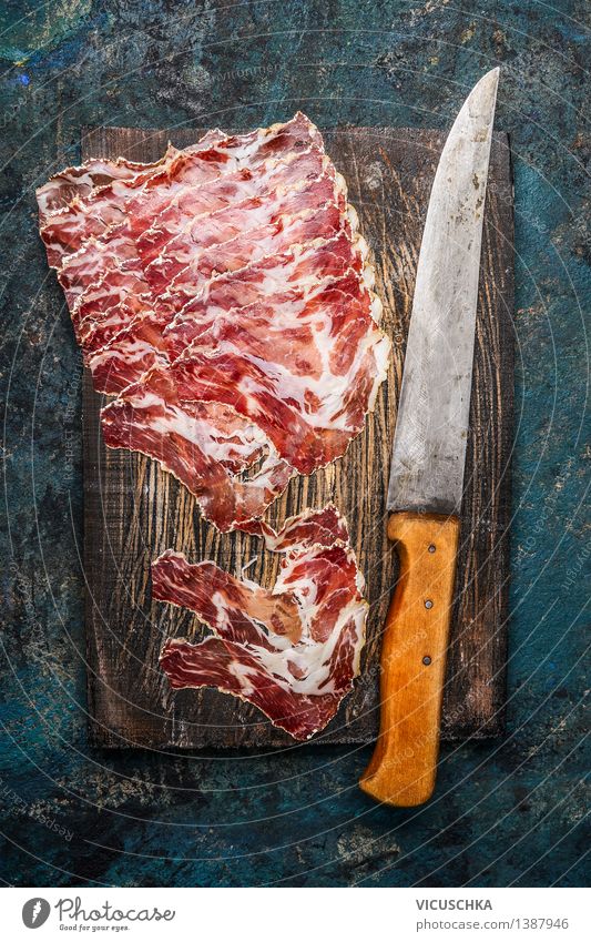 Coppa Schinken mit Küchenmesser Lebensmittel Fleisch Wurstwaren Ernährung Festessen Italienische Küche Messer Stil Design Tisch Feinschmecker Spezialitäten