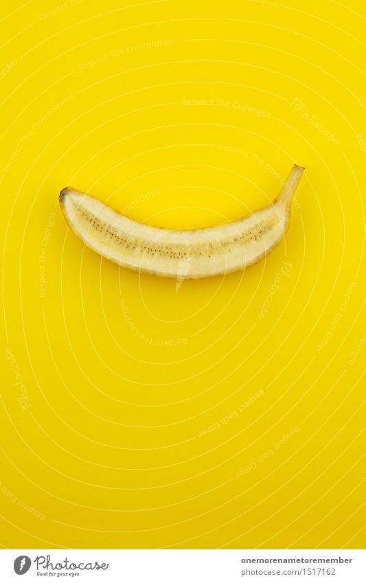 Jammy Halbbanane auf Gelb Kunst Kunstwerk ästhetisch Banane Bananenplantage Bananenmagazin gelb Gelbstich gelbgold lecker Snack krumm Urwald Kreativität Inhalt