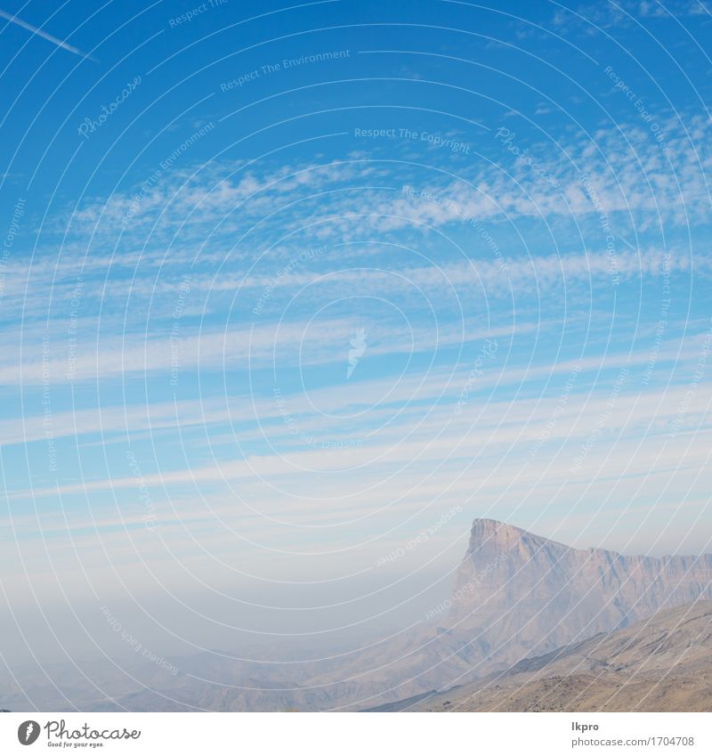 bewölkter Himmel in Oman der alte Berg Ferien & Urlaub & Reisen Abenteuer Expedition Berge u. Gebirge Natur Landschaft Pflanze Wolken Baum Hügel Felsen Schlucht