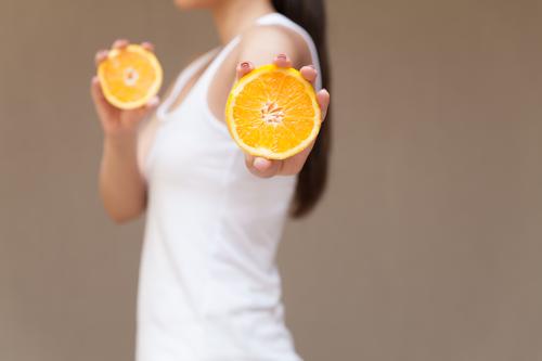 Vitamine Lebensmittel Frucht Orange Mensch feminin Körper Haare & Frisuren 1 Diät sportlich Fröhlichkeit frisch Gesundheit dünn Kraft Ausdauer Fitness Ernährung