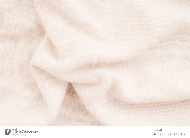 weicher Stoff aus Wolle Lifestyle elegant Stil Design Herbst Mode Bekleidung Pullover trendy Hintergrundbild beige Material Textilien Schal Wärme kuschlig