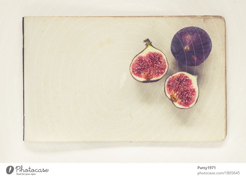Feigen Lebensmittel Frucht Ernährung Vegetarische Ernährung Papier Zettel frisch Gesundheit retro rund saftig süß violett rot genießen Stillleben Farbfoto