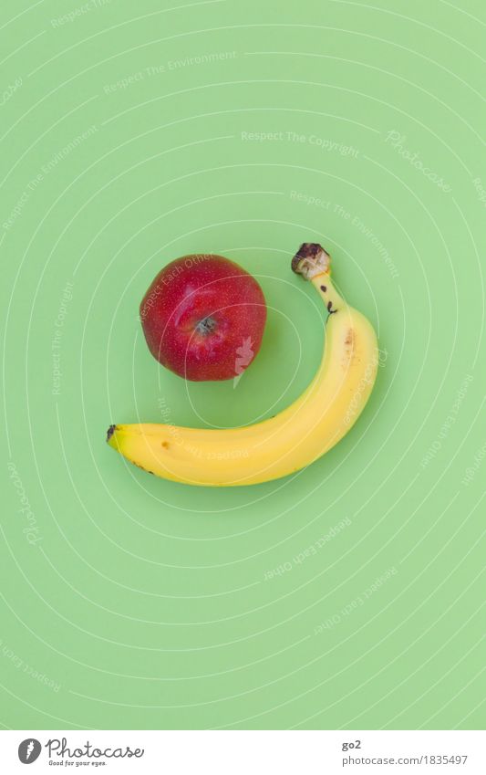 Apfel und Banane Lebensmittel Frucht Ernährung Frühstück Gesundheit Gesunde Ernährung lecker gelb grün rot Vitamin vitaminreich Farbfoto Innenaufnahme