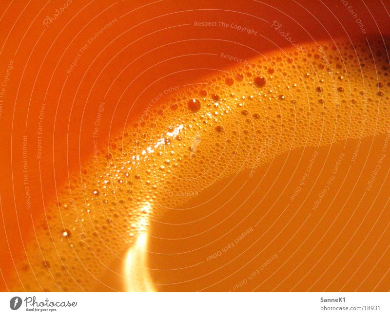 Lecker Kaffee ! Tasse Luftblase Schaum orange Leggo Makroaufnahme