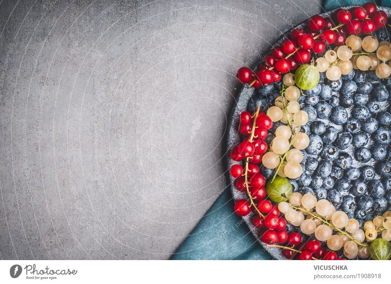 Hintergrund mit verschiedenen Beeren Lebensmittel Frucht Bioprodukte Vegetarische Ernährung Diät Stil Design Gesundheit Gesunde Ernährung Sommer Hintergrundbild