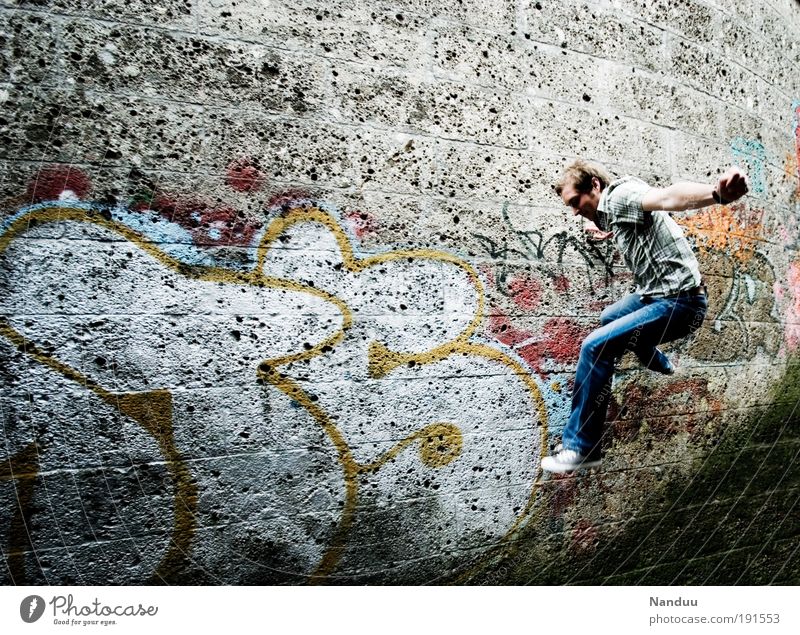 Hüpfer Mensch maskulin 1 18-30 Jahre Jugendliche Erwachsene springen Wand Mauer Graffiti grau Stadt Farbfoto Gedeckte Farben Außenaufnahme