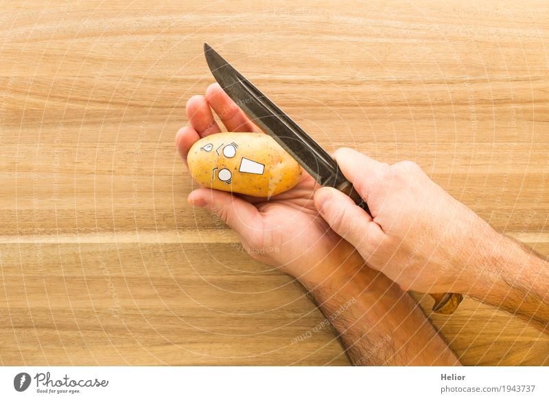 Kartoffel in panischer Angst vor einem scharfen Rüstmesser - ein  lizenzfreies Stock Foto von Photocase