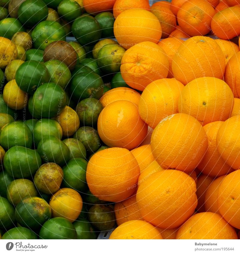 Grürange Lebensmittel Frucht Orange Ernährung Gesundheit Duft exotisch lecker mehrfarbig grün Appetit & Hunger Energie Natur Malaysia Markt Marktstand Kontrast