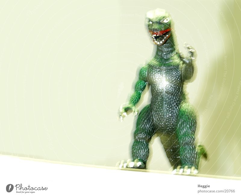 Godzilla Filmstar Monster Dinge grünes Tier Unschärfe