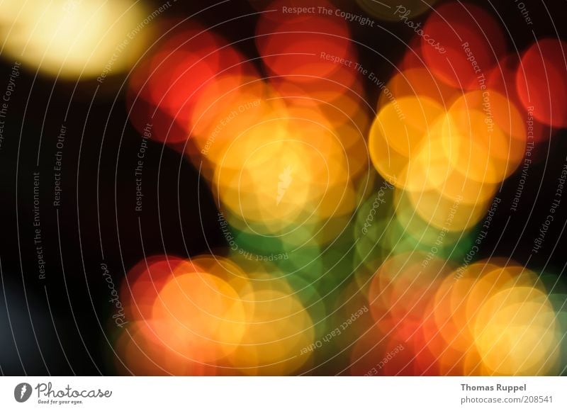 gelb, orange, rot, grün Lampe leuchten leuchtende Farben glühen glühend mehrfarbig Lichterscheinung Kreis kreisrund Hintergrundbild dunkel hell Farbfoto