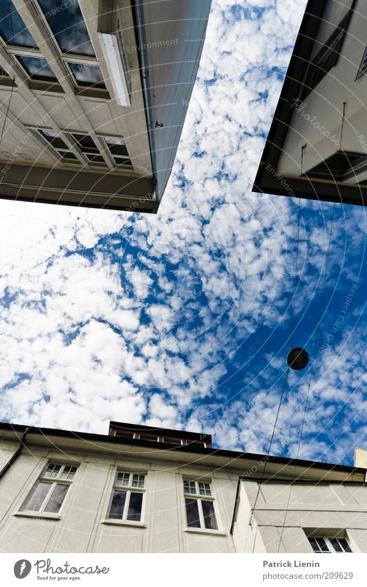 look in the sky Umwelt Luft Wolken Sommer Klima Klimawandel Haus Bauwerk Gebäude Architektur Fenster Blick Stimmung blau oben Ferne Verzerrung Farbfoto