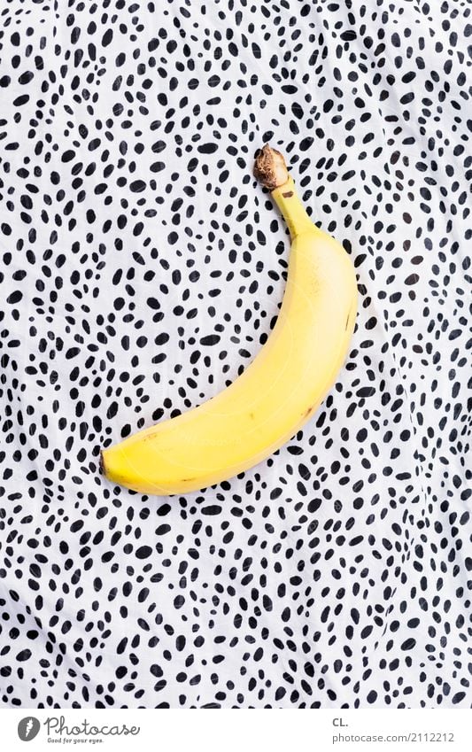 banane auf stoff Lebensmittel Frucht Banane Ernährung Frühstück Bioprodukte Vegetarische Ernährung Diät Fasten Gesunde Ernährung Kunst Stoff Punkt ästhetisch