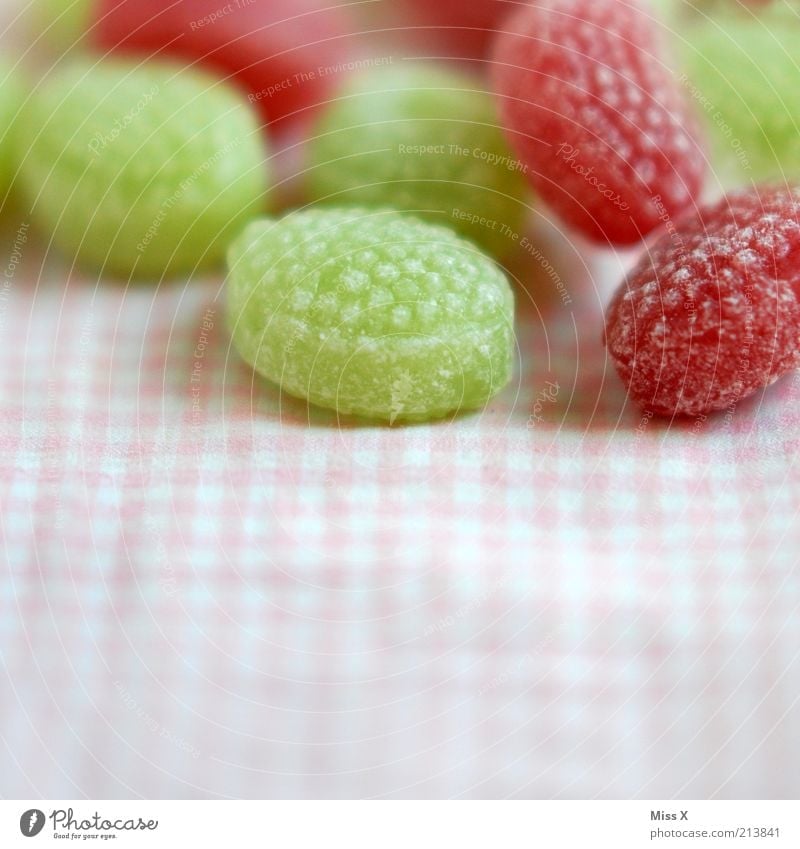zuckersüß Lebensmittel Süßwaren Ernährung klein lecker rund sauer grün rosa Appetit & Hunger Bonbon Zucker Klebrig fruchtbonbon Farbfoto mehrfarbig