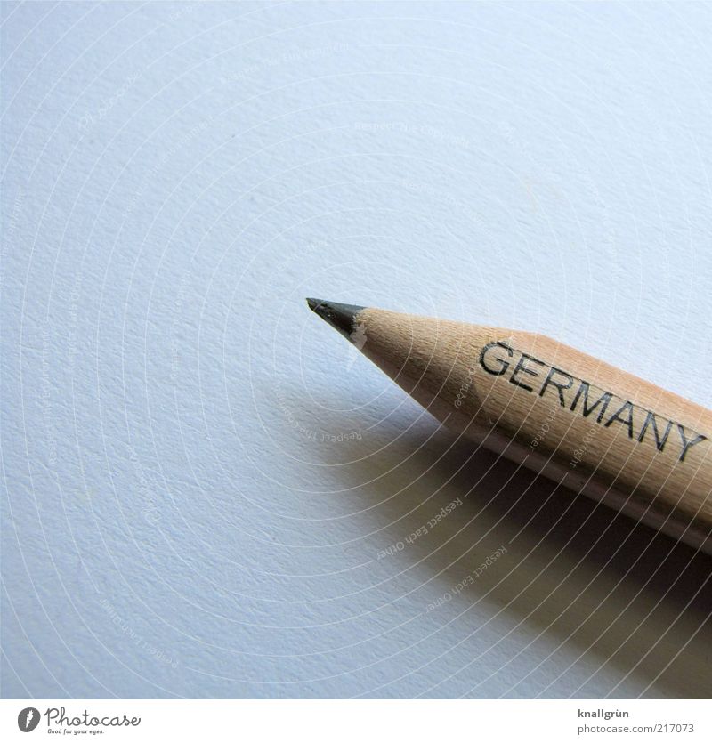 Made in Germany Bleistift Schreibstift Schriftzeichen Spitze braun grau weiß Inspiration Qualität Wert angespitzt Schreibgerät zeichnen Farbfoto Gedeckte Farben