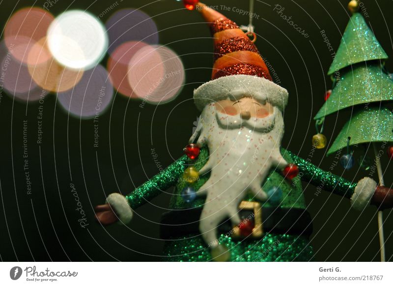hohooo Bart Kunst weißhaarig dunkel grün schwarz Idylle Nostalgie Weihnachtsmann Nikolausmütze Figur Weihnachtsfigur Perle Lichtpunkt glänzend Farbfoto