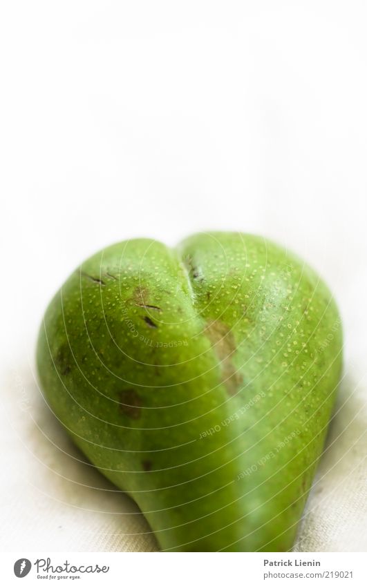 Birnenhintern Lebensmittel Frucht ästhetisch dick exotisch fest frech Gesundheit glänzend schön lecker rund Gesäß vorstellen grün assoziativ Linie Farbfoto