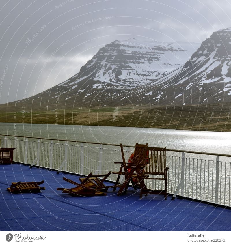 Island Umwelt Natur Landschaft Wasser Himmel Wolken Klima schlechtes Wetter Hügel Felsen Berge u. Gebirge Schneebedeckte Gipfel Küste Fjord Meer Schifffahrt