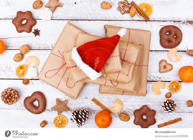 kleine Weihnachtsmütze auf Weihnachtsgeschenke Frucht Orange Süßwaren Winter Weihnachten & Advent Mütze Dekoration & Verzierung Vorfreude Geschenk Lebkuchen