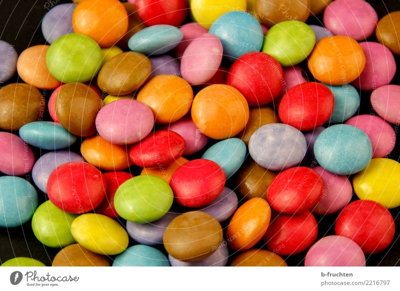 Schokolinsen Süßwaren Fröhlichkeit mehrfarbig Genusssucht Drogensucht Tablette süß verteilt Freude Diät Sucht Krankheit Auswahl Verschiedenheit Farbfoto