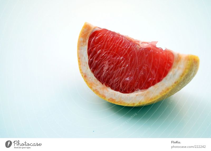 grinse-Grapefruit Lebensmittel Frucht Ernährung Bioprodukte Vegetarische Ernährung Diät frisch lecker saftig sauer süß rot Zitrusfrüchte Südfrüchte