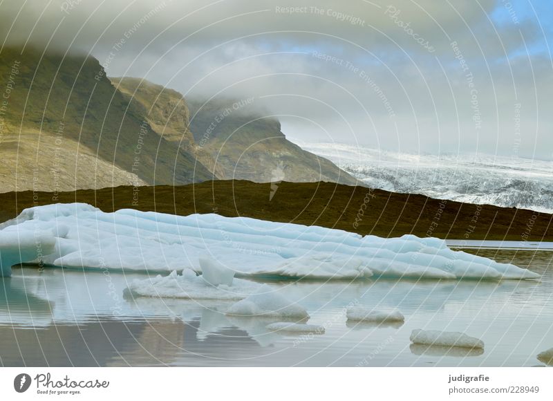Island Umwelt Natur Landschaft Urelemente Wasser Himmel Wolken Klima Eis Frost Felsen Berge u. Gebirge Gletscher See Fjallsárlón kalt wild Farbfoto