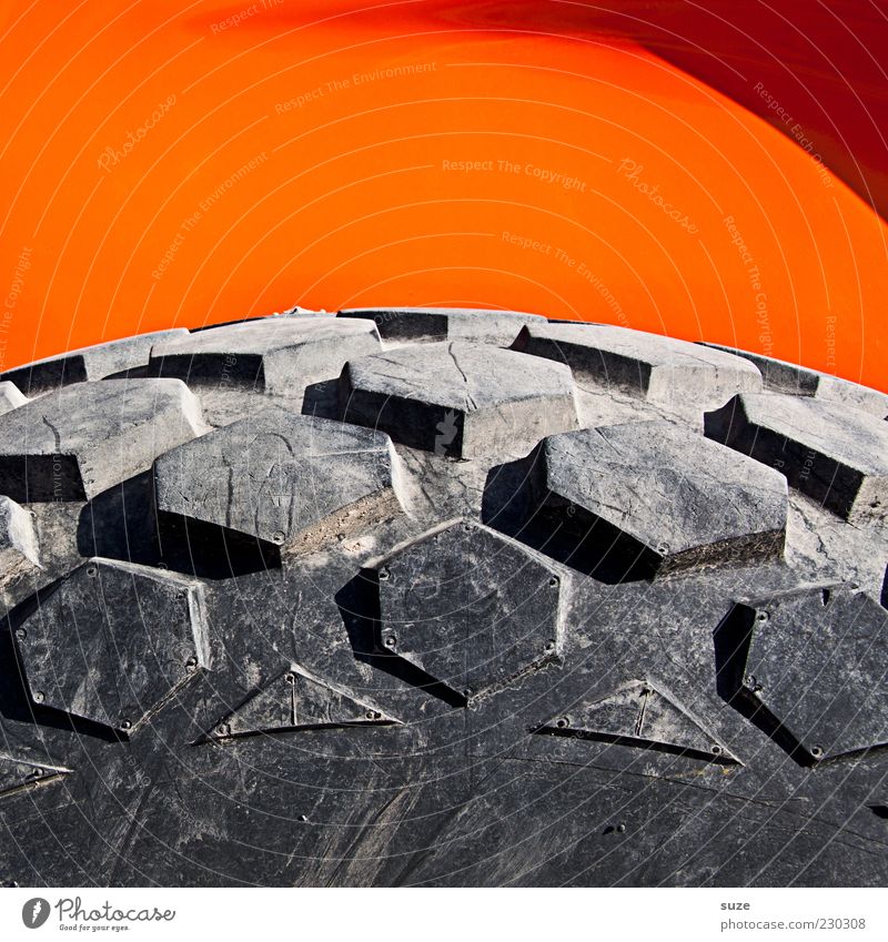 Bild mit Profil Baustelle einfach rund grau orange Reifen Reifenprofil Rad Gummi groß Baufahrzeug Farbfoto mehrfarbig Außenaufnahme Nahaufnahme Detailaufnahme