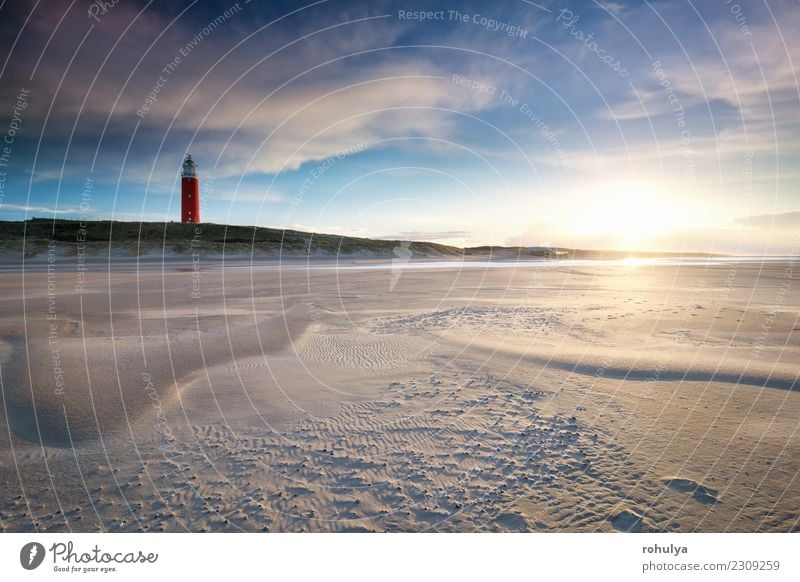 Sonnenuntergang hinter dem roten Leuchtturm an der Nordseeküste Ferien & Urlaub & Reisen Strand Natur Landschaft Sand Himmel Wolken Sonnenaufgang Schönes Wetter