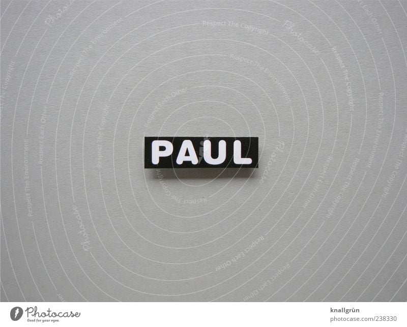 Wer ist Paul? Schriftzeichen Schilder & Markierungen eckig grau schwarz weiß Vorname maskulin Buchstaben Großbuchstabe Schwarzweißfoto Studioaufnahme