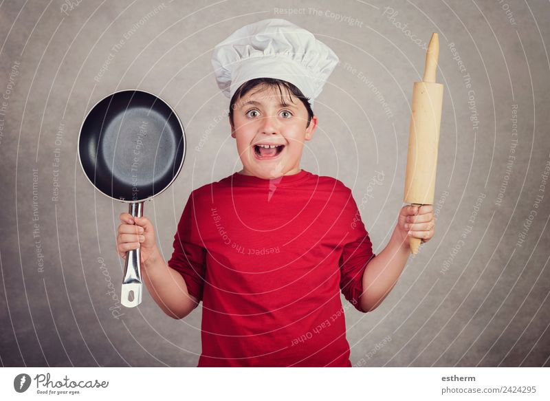 wütend Koch Kind auf grauem Hintergrund Lebensmittel Ernährung Arbeit & Erwerbstätigkeit Beruf Gastronomie Mensch maskulin Kleinkind Junge Kindheit 1 8-13 Jahre
