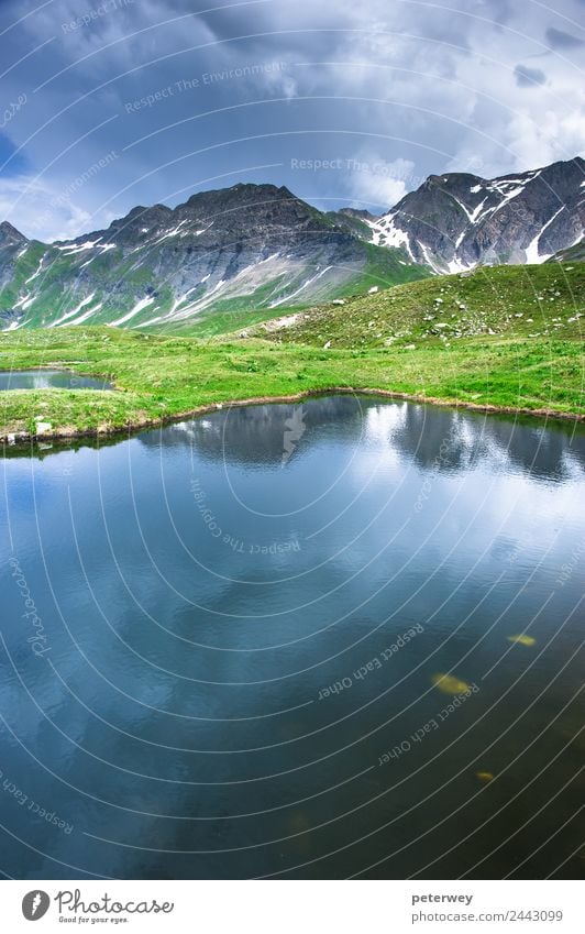 Small mountain lake in Greina valley, Tessin, Switzerland Tourismus Ausflug Natur Gewitterwolken Berge u. Gebirge See wandern blau grau grün alpin alps blue