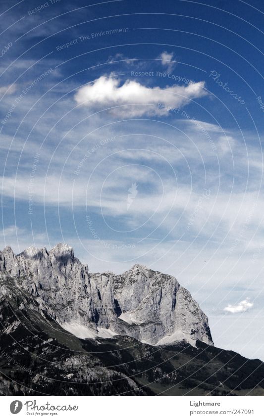 Über den Steinen Ferne Expedition Berge u. Gebirge Klettern Bergsteigen Natur Landschaft Wolken Wetter Schönes Wetter Felsen Alpen Gipfel blau grau Stimmung