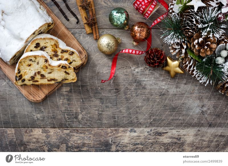 Christstollen auf Holzgrund Lebensmittel Frucht Kuchen Dessert Ferien & Urlaub & Reisen Dekoration & Verzierung Feste & Feiern Weihnachten & Advent Ball lecker