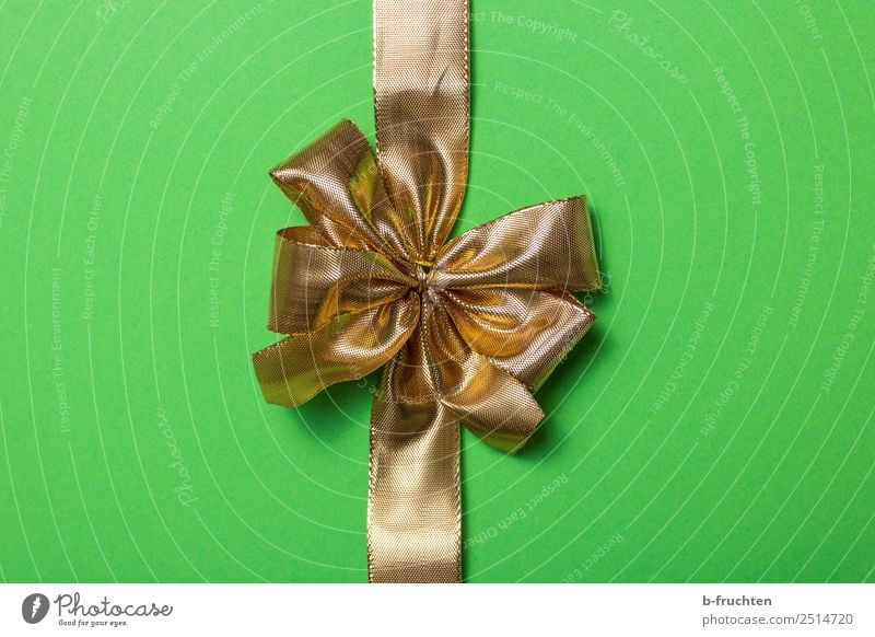goldene Geschenkschleife Feste & Feiern Hochzeit Geburtstag Papier Verpackung Paket grün Verschwiegenheit Neugier Überraschung geheimnisvoll Schlaufe Schleife