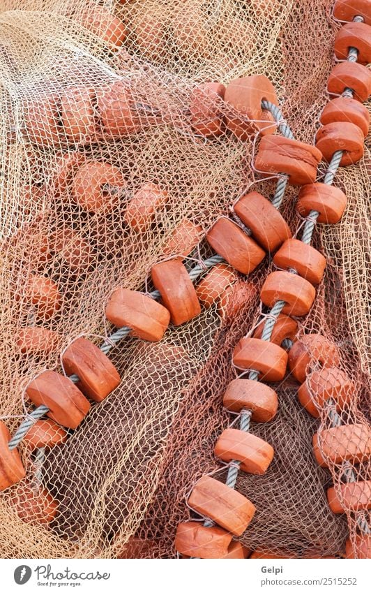 Detail eines alten traditionellen Fischernetzes Meer Industrie Seil Wasserfahrzeug Tradition Hintergrund Ballast Boje Bojen fangen Schnur Cork Handwerkskunst