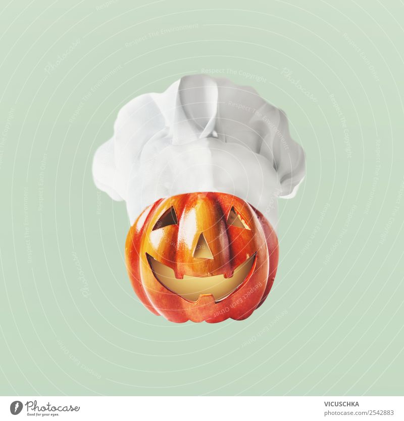 Lustig geschnitztes Kürbis Gesicht mit Kochmütze Lebensmittel Ernährung kaufen Design Feste & Feiern Halloween Dekoration & Verzierung Zeichen Kopf