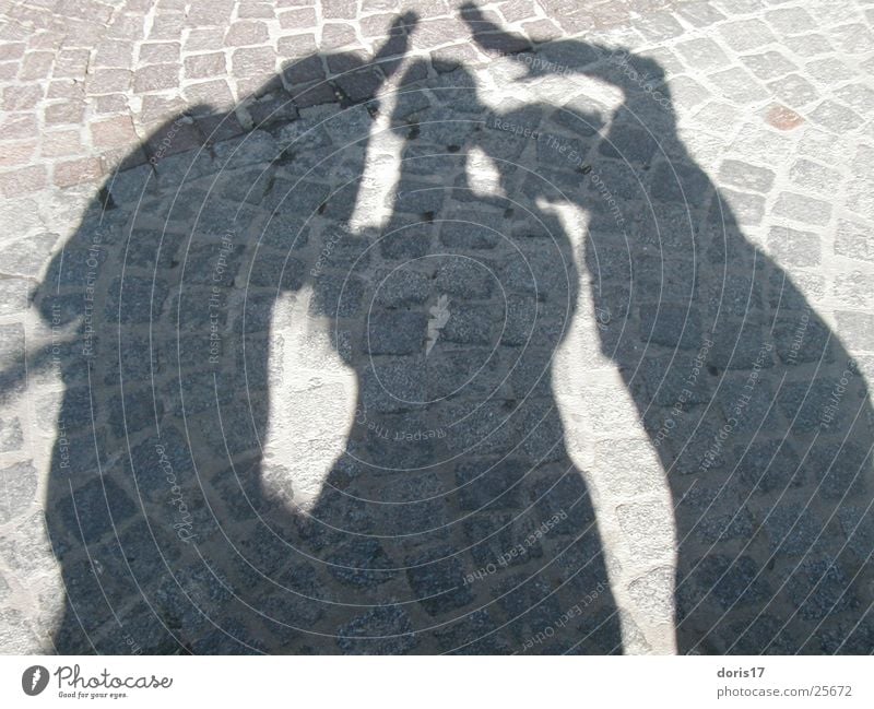 Schatten Frau abstrakt Mensch Sonnenschatten Kombination Pflastersteine