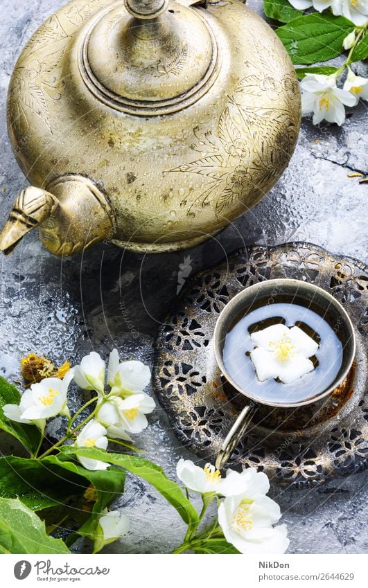 Tee mit Jasmin trinken Gesundheit Kräuterbuch Blume Tasse Getränk grün Türkisch Östlich altehrwürdig arabisch retro Ornament muslimisch Kannen islamisch Ritual