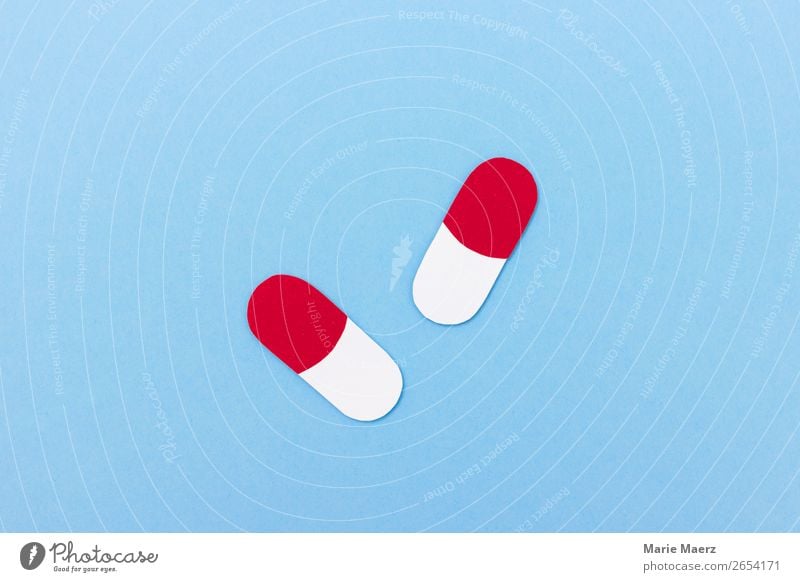 Zwei rot-weiße Pillen in Kapsel-Form aus Papier schön Gesundheit Gesundheitswesen Rauschmittel Medikament alt Essen einfach blau Laster Schmerz Sucht Tablette