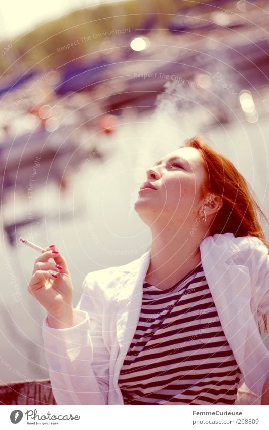 Taking a cigarette break II. feminin Junge Frau Jugendliche Erwachsene Kopf Hand 1 Mensch 18-30 Jahre Erholung Sucht Zigarette Zigarettenrauch Zigarettenmarke